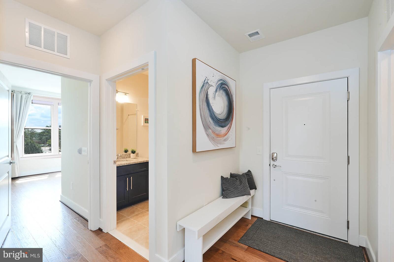 11200 Reston Station Boulevard, Unit 508 Reston, VA 20190 - Photo 3 of 29 Foyer