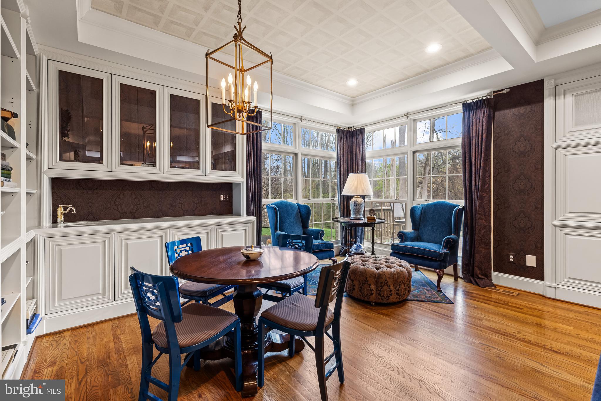 7 Hambleton Court Baltimore, MD 21208 - Photo 16 of 61 a view of a dining room with furniture window and wooden floor
