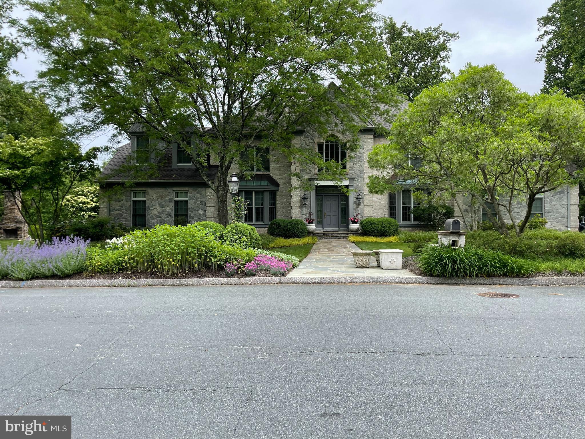 7 Hambleton Court Baltimore, MD 21208 - Photo 2 of 61 a front view of a house with yard and green space