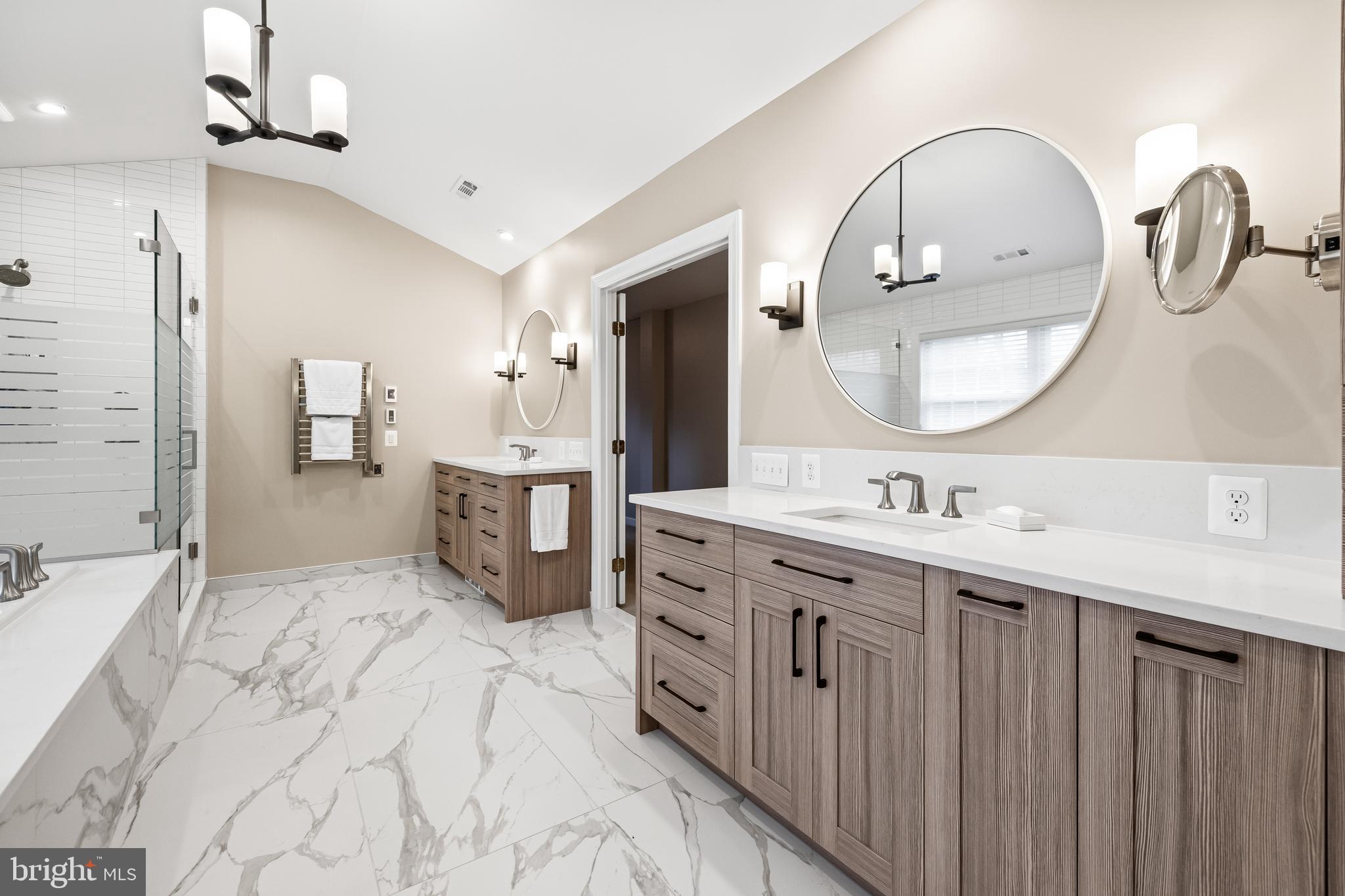 7 Hambleton Court Baltimore, MD 21208 - Photo 35 of 61 a spacious bathroom with a double vanity sink double and mirror
