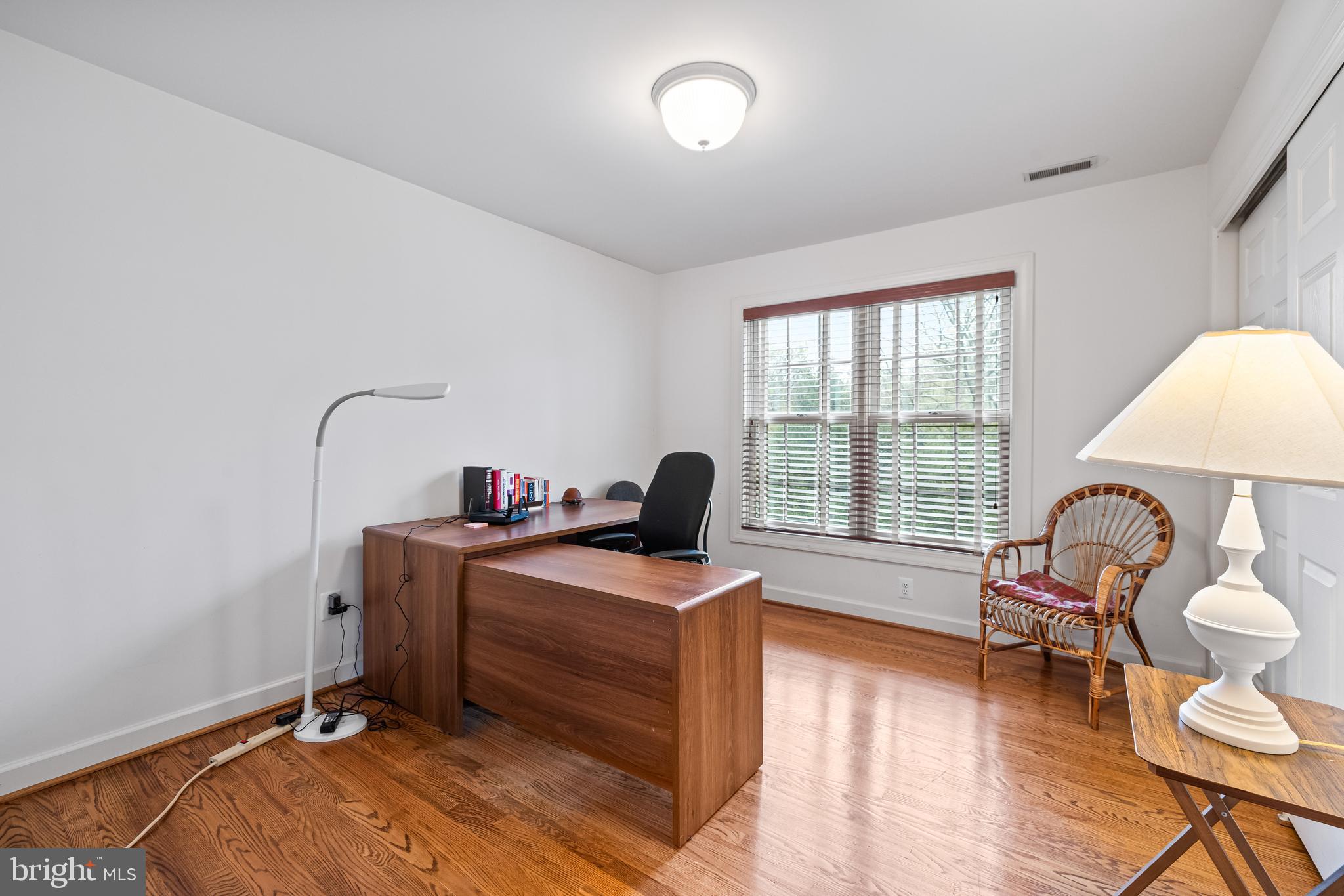 7 Hambleton Court Baltimore, MD 21208 - Photo 47 of 61 a view of a workspace with furniture and a window