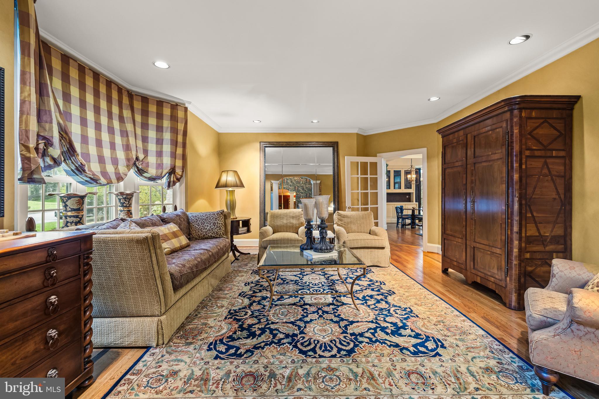 7 Hambleton Court Baltimore, MD 21208 - Photo 9 of 61 a living room with furniture and a rug