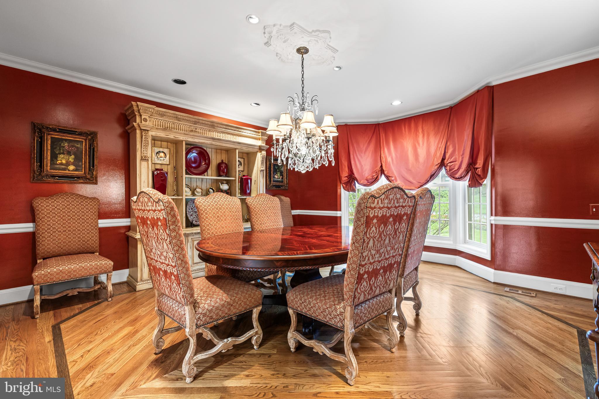 7 Hambleton Court Baltimore, MD 21208 - Photo 10 of 61 a view of a dining room with furniture window and wooden floor