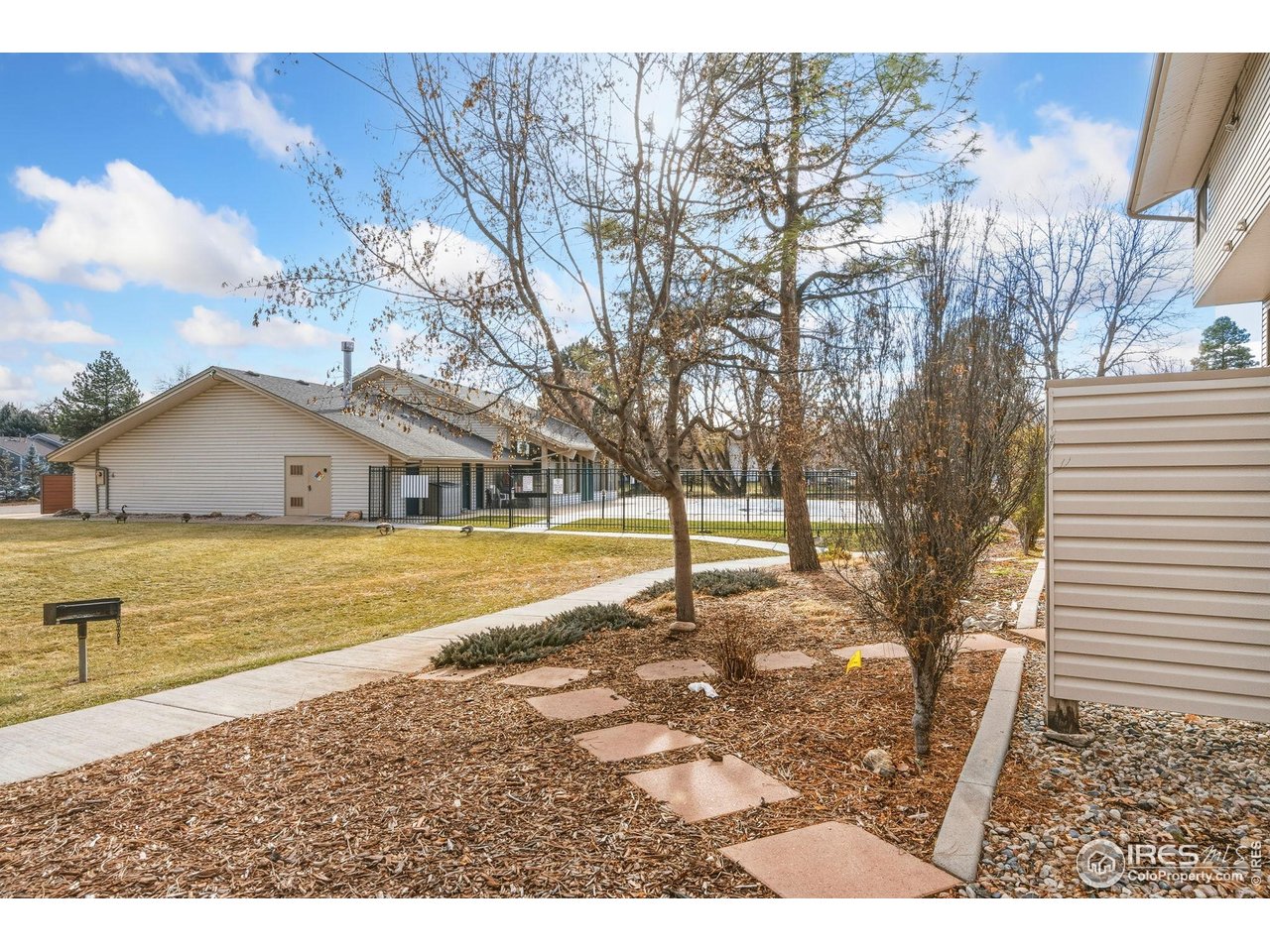1705 Heatheridge Road, Unit 103 Fort Collins, CO 80526 - Photo 16 of 16 a view of swimming pool with an outdoor space