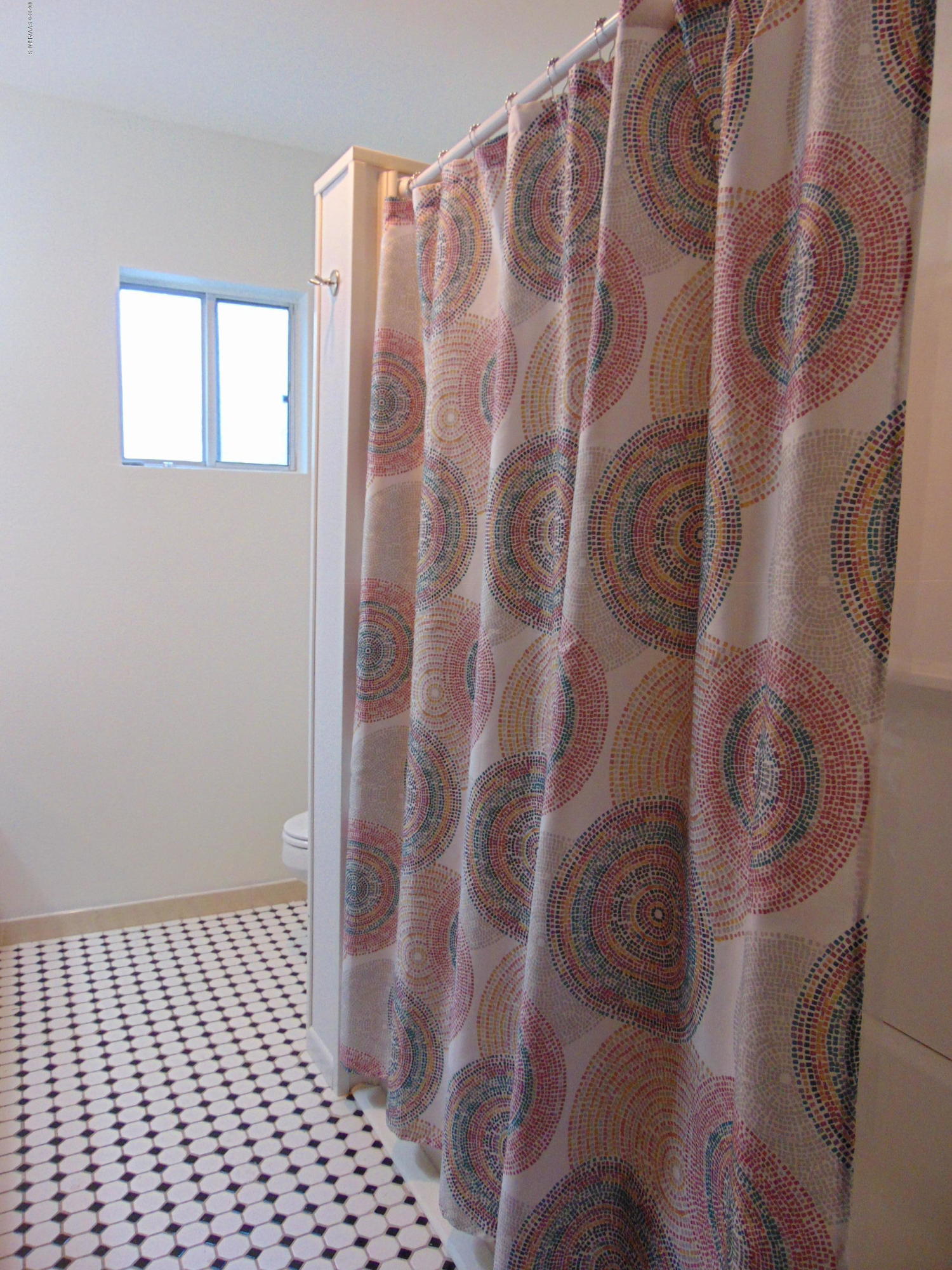 3548 East Rimrock Drive Rimrock, AZ 86335 - Photo 13 of 30 a bathroom with a shower curtain