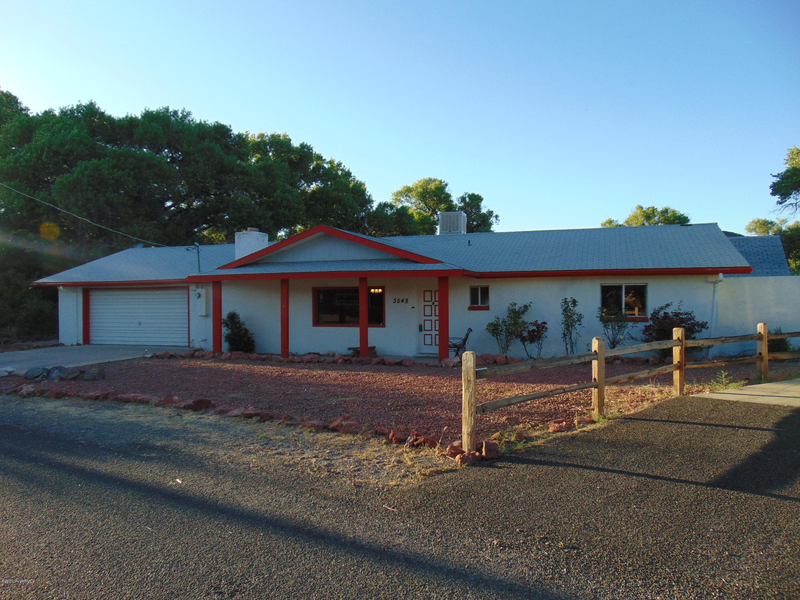 3548 East Rimrock Drive Rimrock, AZ 86335 - Photo 30 of 30 a view of a house with wooden fence next to a road