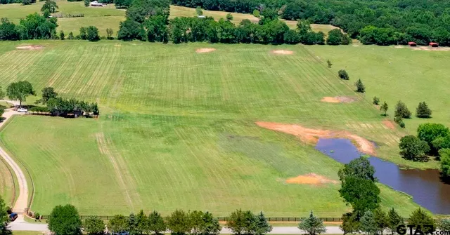a view of a lake with a large building