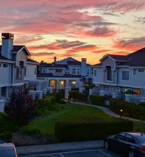 a view of a house with a garden