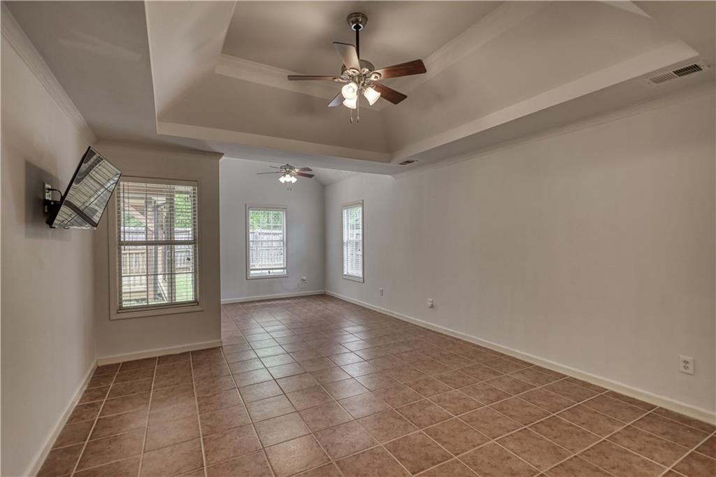115 Huntington Street Covington, GA 30016 - Photo 27 of 77 a view of an empty room with a window