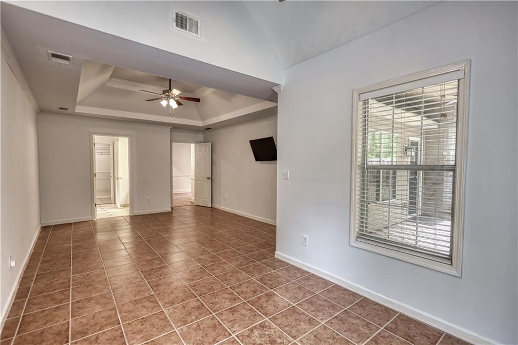 115 Huntington Street Covington, GA 30016 - Photo 29 of 77 a view of an empty room with a window