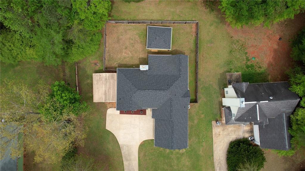 115 Huntington Street Covington, GA 30016 - Photo 70 of 77 an aerial view of a house with a yard