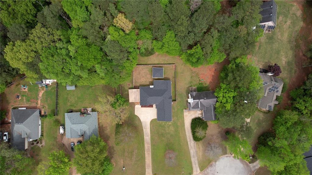 115 Huntington Street Covington, GA 30016 - Photo 71 of 77 an aerial view of residential houses with outdoor space