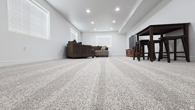 1437 925 South Vernal, UT 84078 - Photo 17 of 47 Carpeted living area featuring recessed lighting, white walls, and multiple windows with blinds
