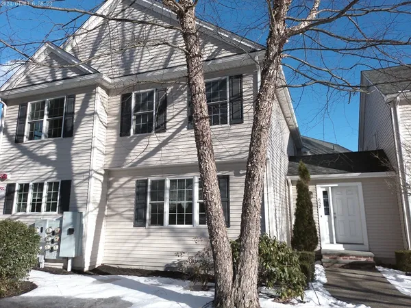 a view of a house with a street