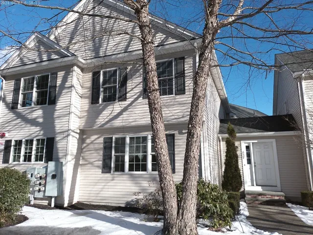 a view of a house with a street