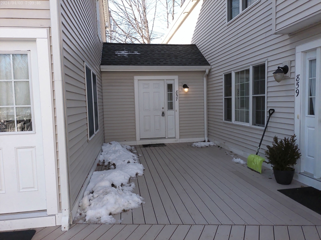 857 Washington Street, Unit 857 Canton, MA 02021 - Photo 17 of 17 a view of a house with a backyard