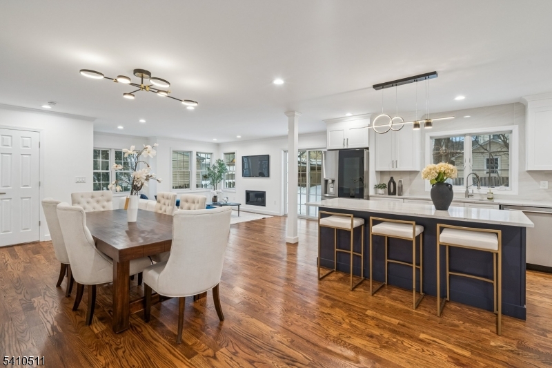 161 Myrtle Avenue Millburn, NJ 07041 - Photo 3 of 43 a large kitchen with a table and chairs