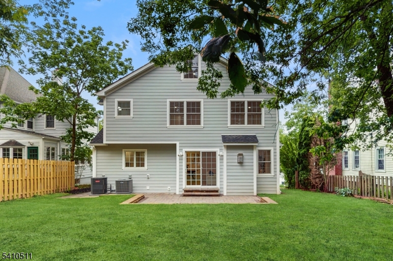 161 Myrtle Avenue Millburn, NJ 07041 - Photo 34 of 43 a front view of a house with a garden