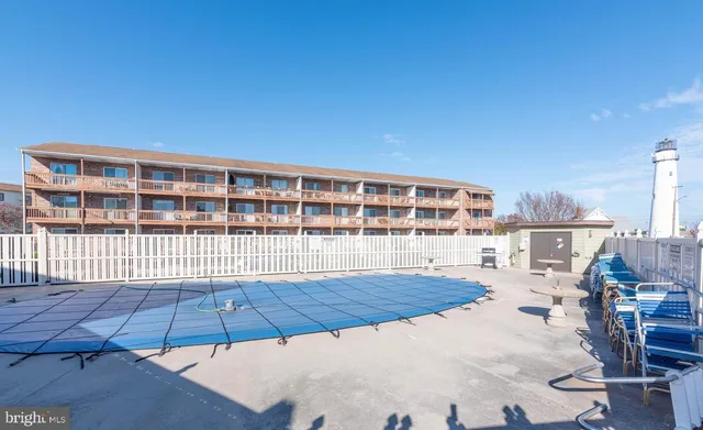 a view of a balcony with a lounge chair