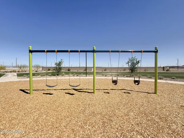 a view of a swimming pool and lounge chair