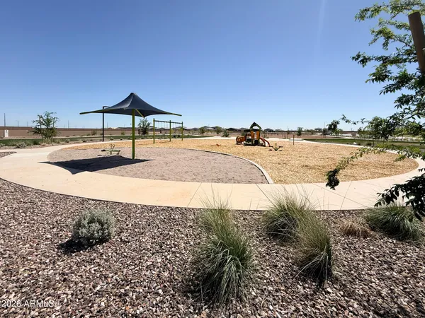 a view of a street with an outdoor space