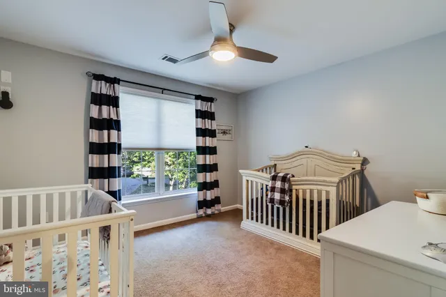 a view of livingroom with furniture and windows