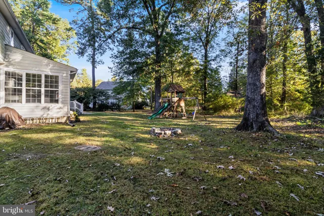 a view of a tree in front of a house