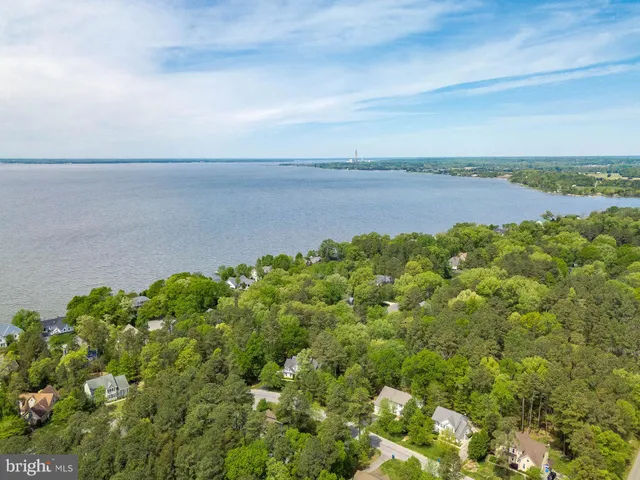 a view of a lake with a yard