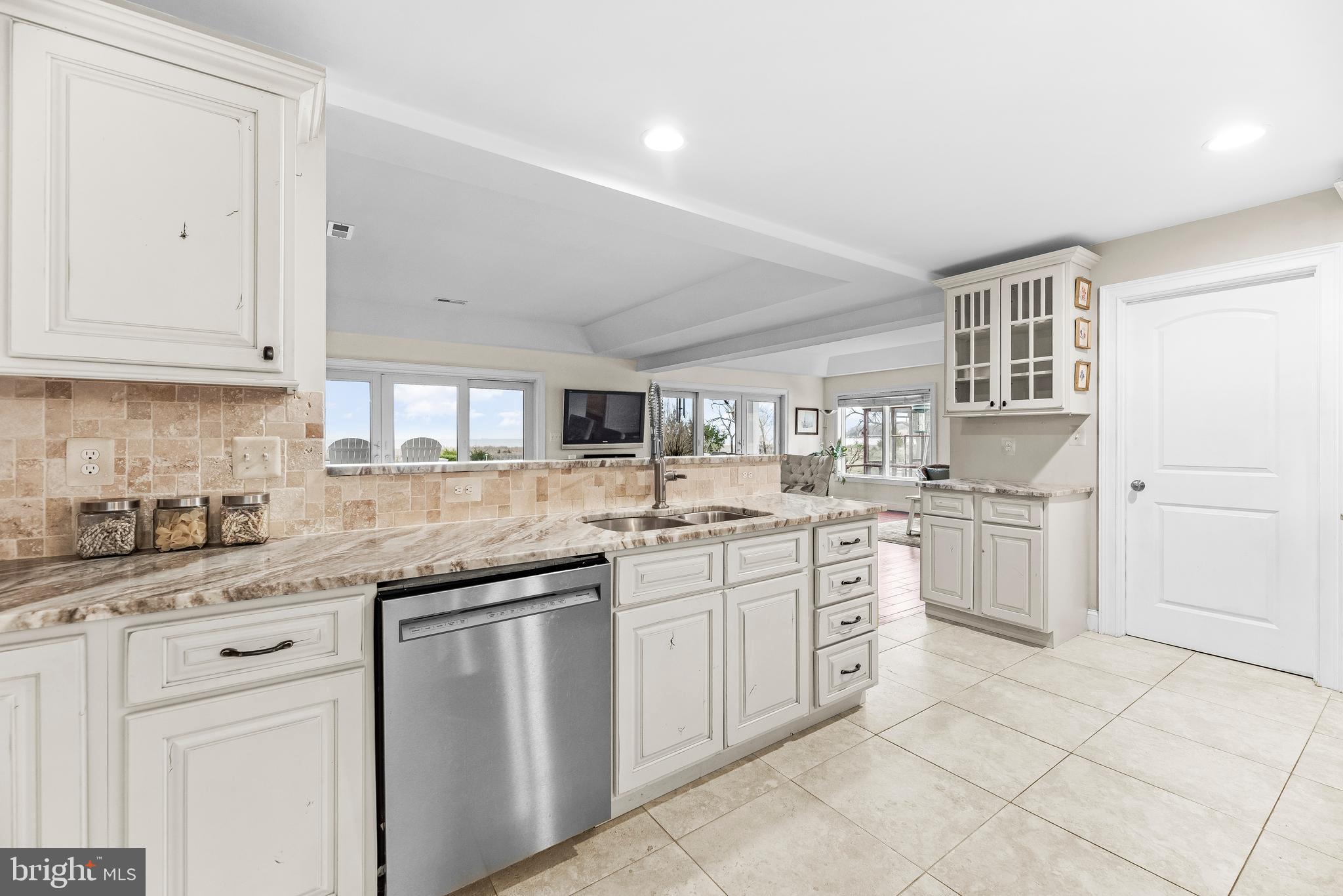 3095 Calvert Boulevard Lusby, MD 20657 - Photo 12 of 105 Open concept kitchen enables ease of conversation.