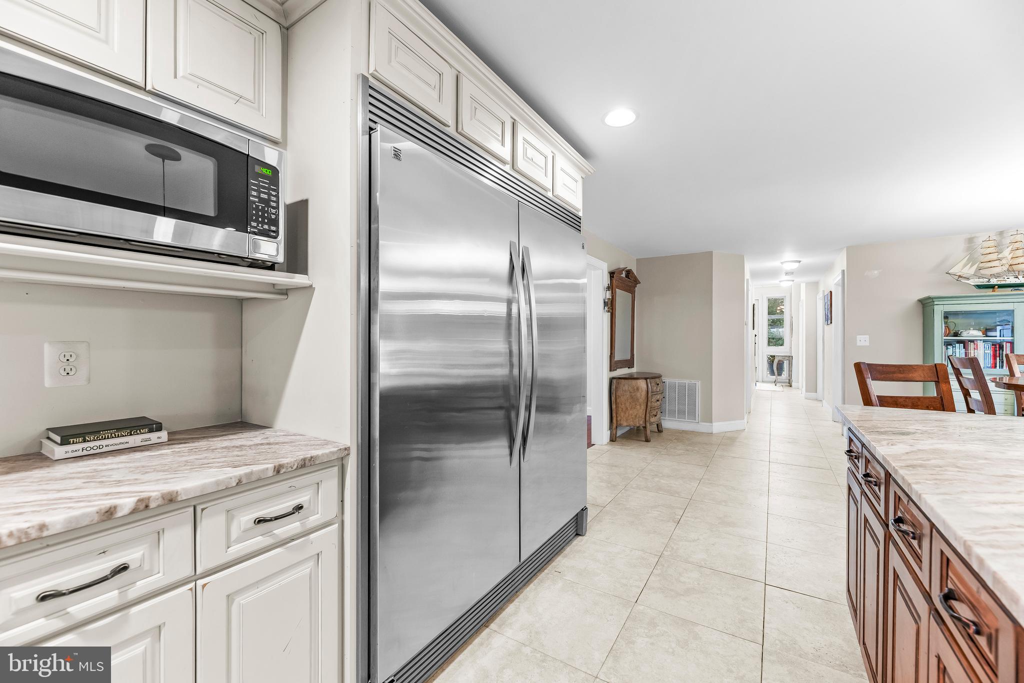 3095 Calvert Boulevard Lusby, MD 20657 - Photo 15 of 105 Oversized stainless refrigerator is party-ready!