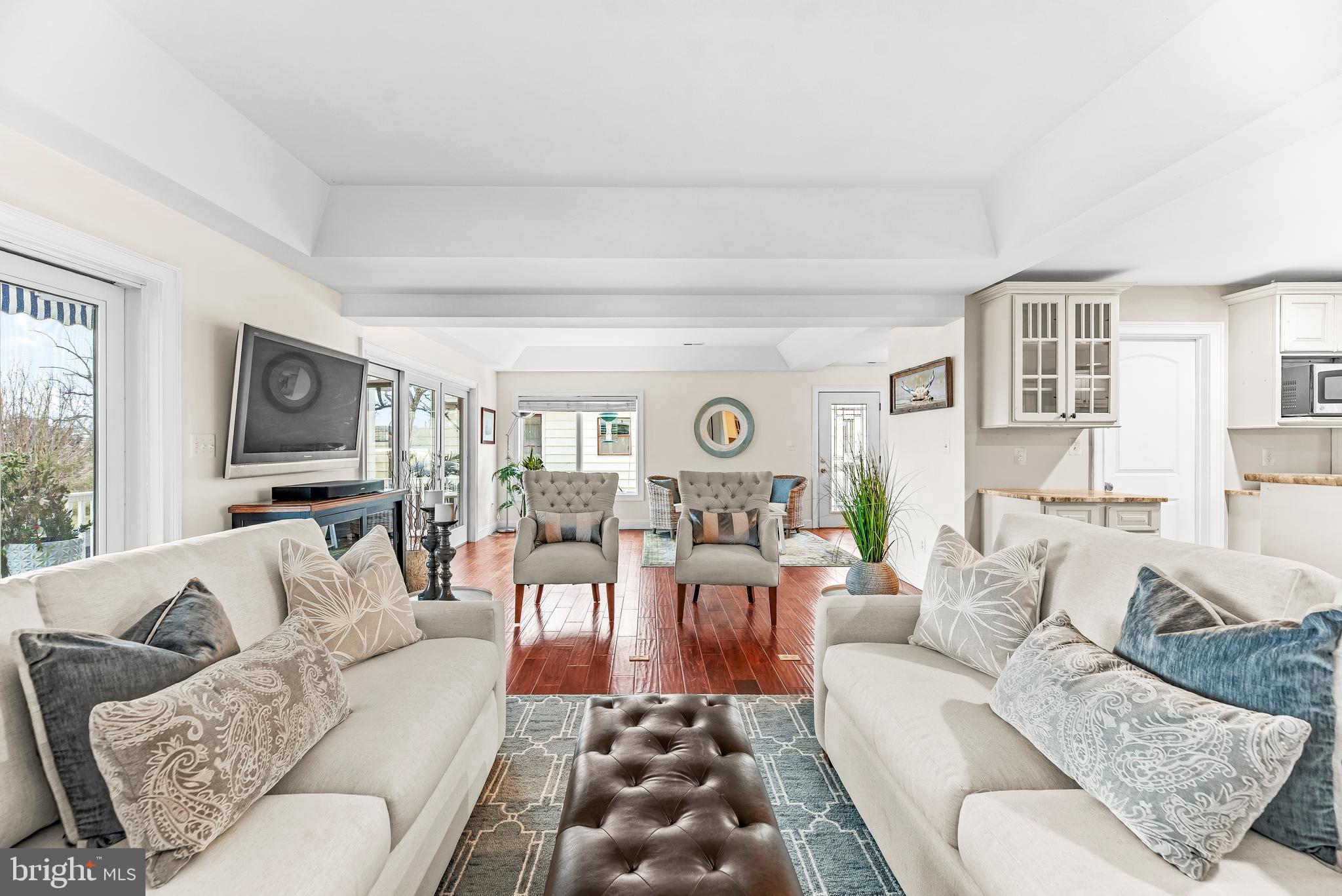 3095 Calvert Boulevard Lusby, MD 20657 - Photo 19 of 105 a living room with furniture and a large window