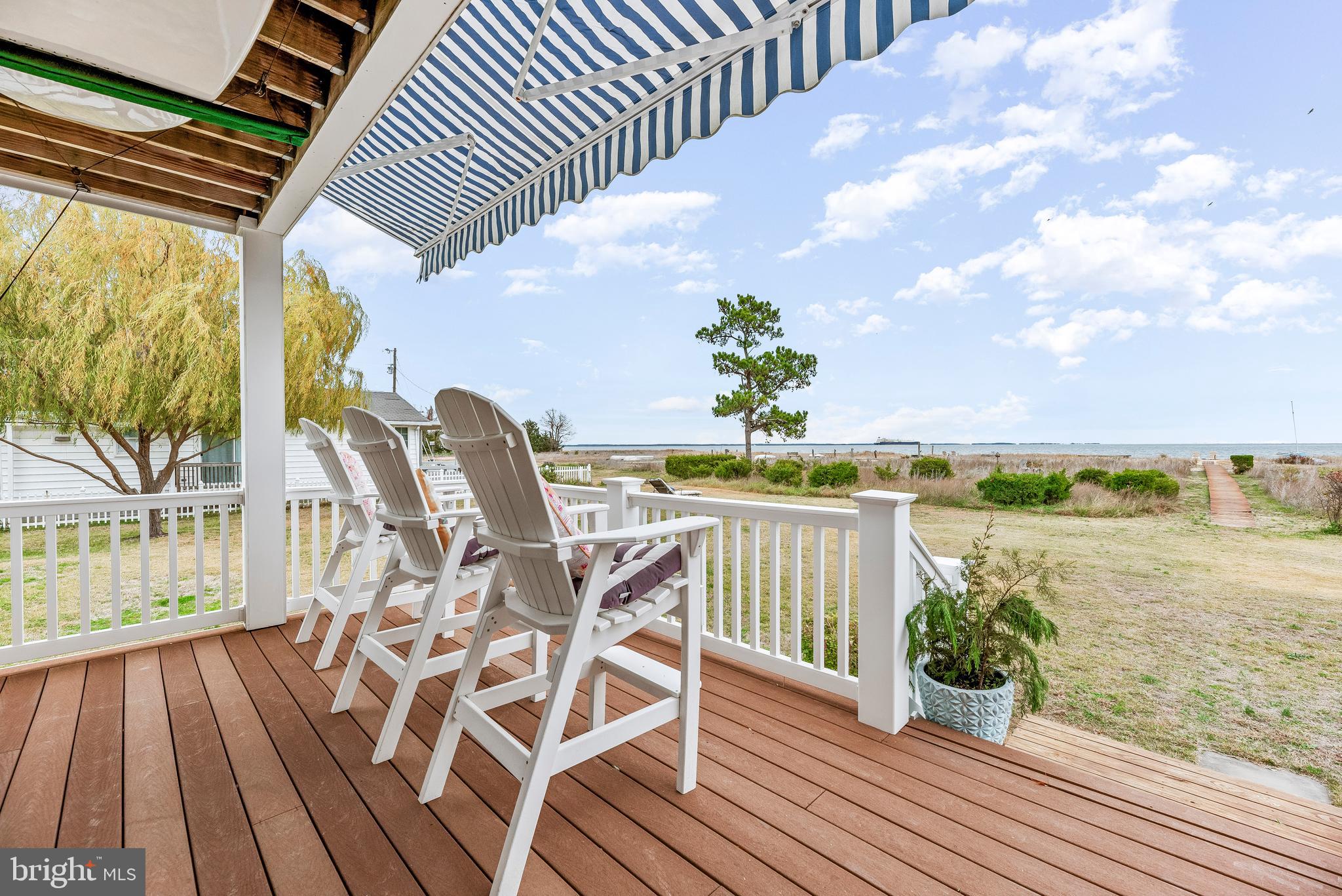 3095 Calvert Boulevard Lusby, MD 20657 - Photo 23 of 105 a view of a balcony with chairs