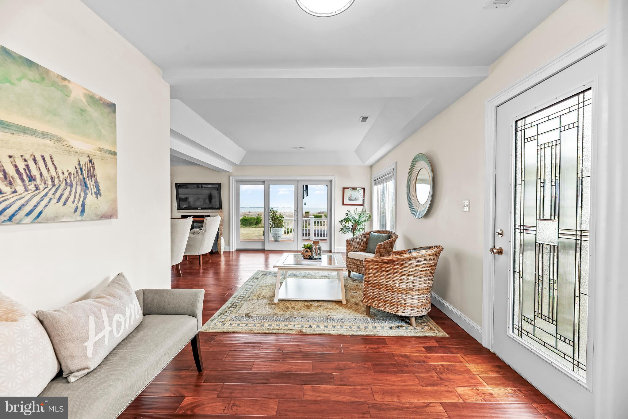 3095 Calvert Boulevard Lusby, MD 20657 - Photo 27 of 105 a living room with furniture and a large window