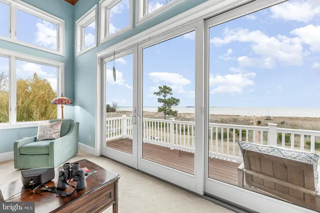 a bathroom with a granite countertop sink a mirror and shower