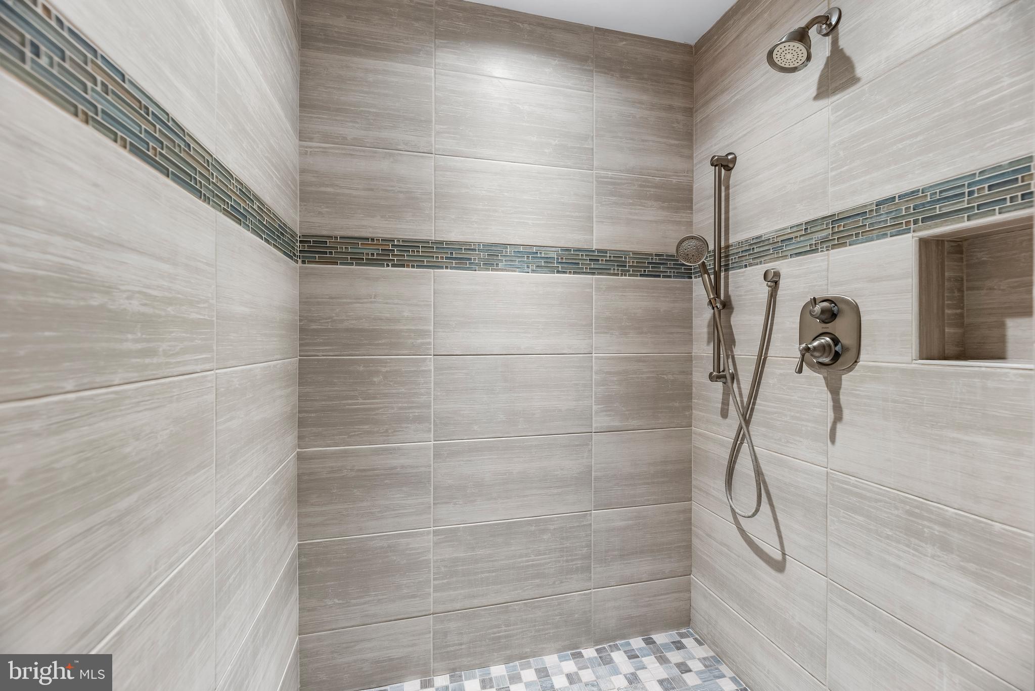 3095 Calvert Boulevard Lusby, MD 20657 - Photo 48 of 105 a bathroom with a shower