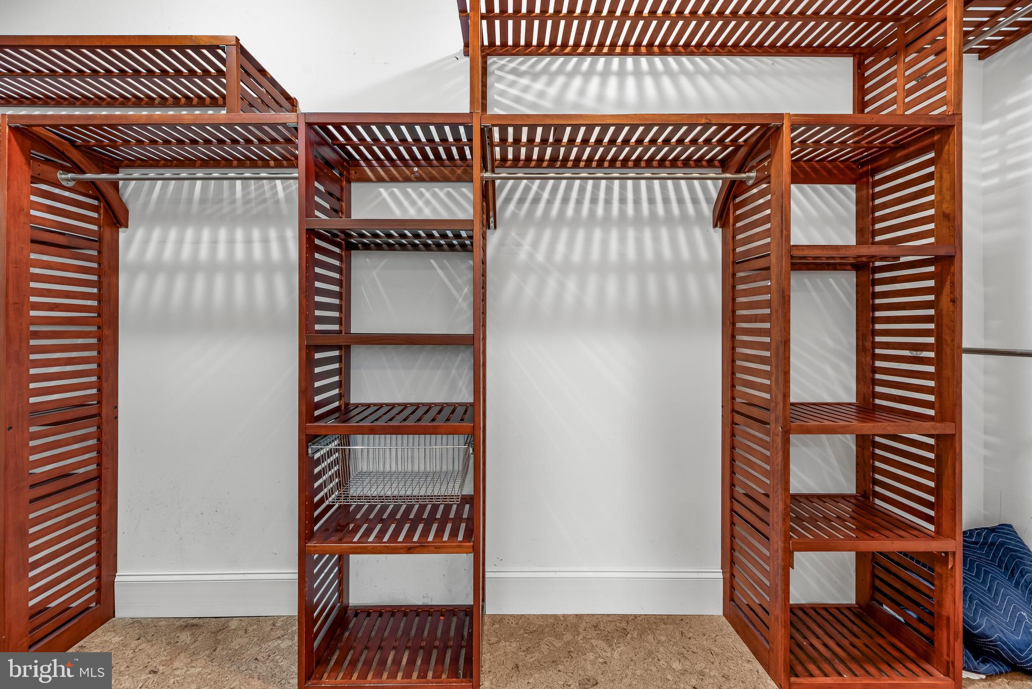 3095 Calvert Boulevard Lusby, MD 20657 - Photo 49 of 105 Walk-in closet with storage shelves.