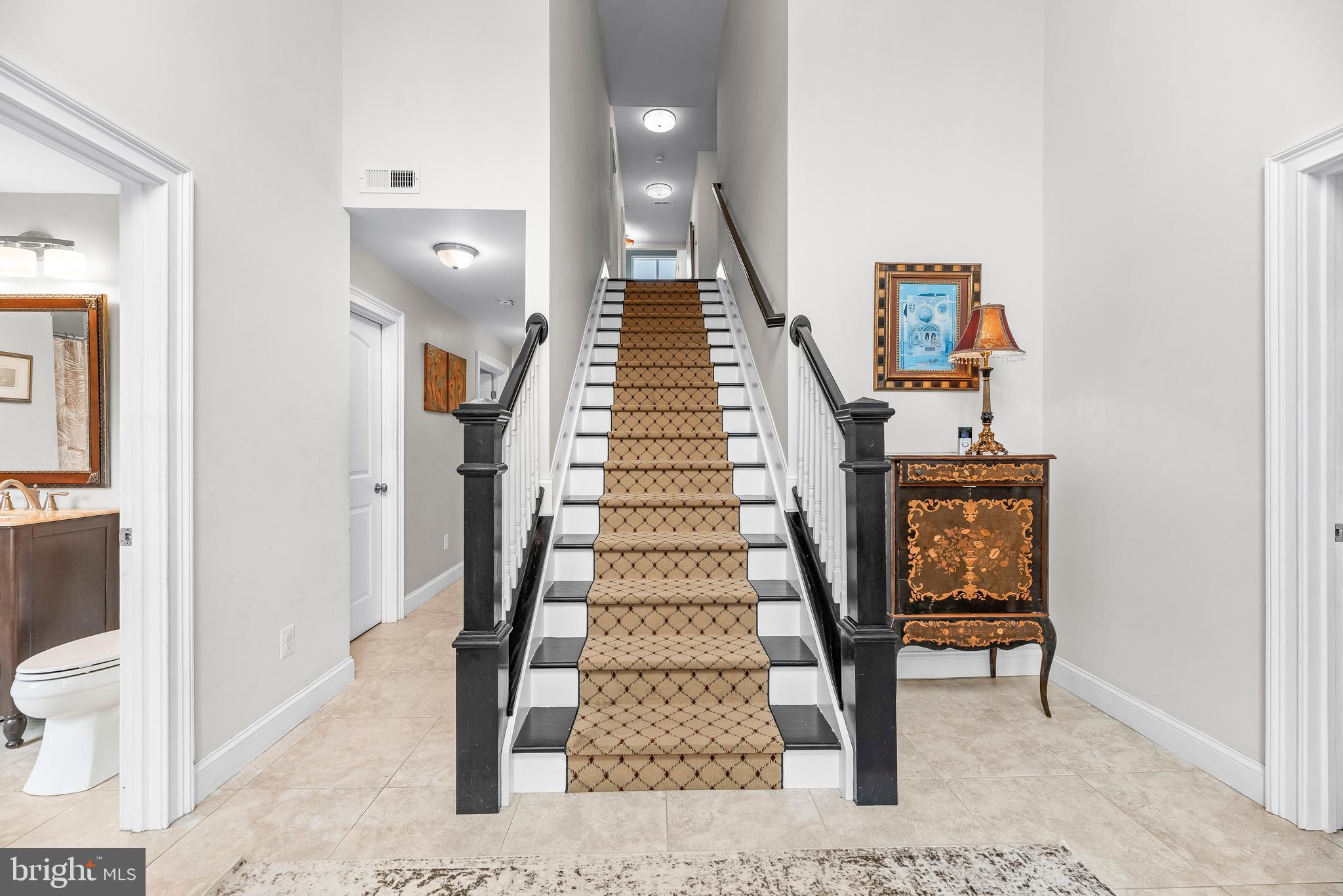 3095 Calvert Boulevard Lusby, MD 20657 - Photo 5 of 105 a view of entryway and hall with wooden floor