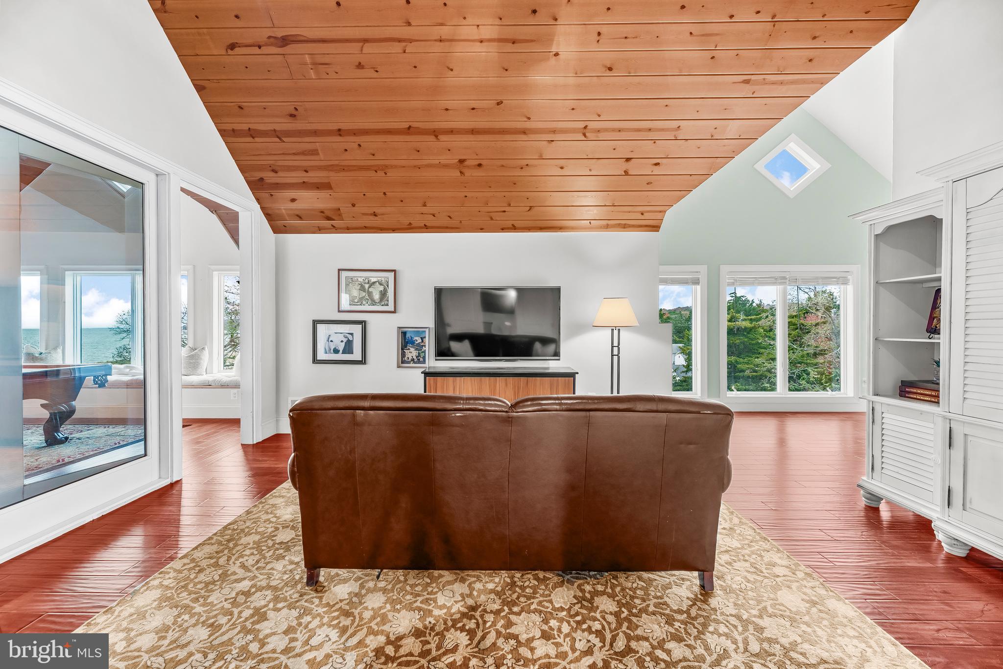 3095 Calvert Boulevard Lusby, MD 20657 - Photo 62 of 105 a living room with furniture and flat screen tv