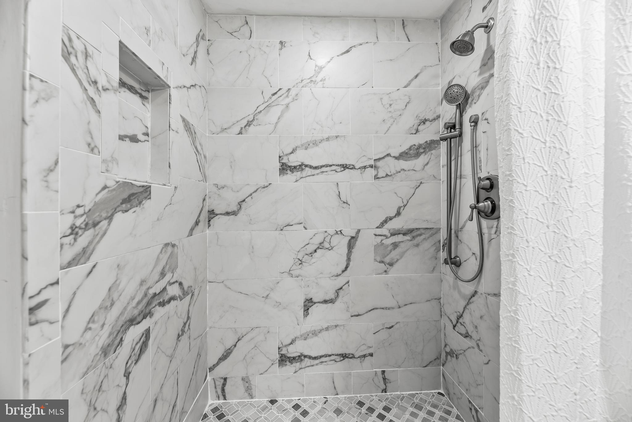 3095 Calvert Boulevard Lusby, MD 20657 - Photo 69 of 105 a bathroom with a shower