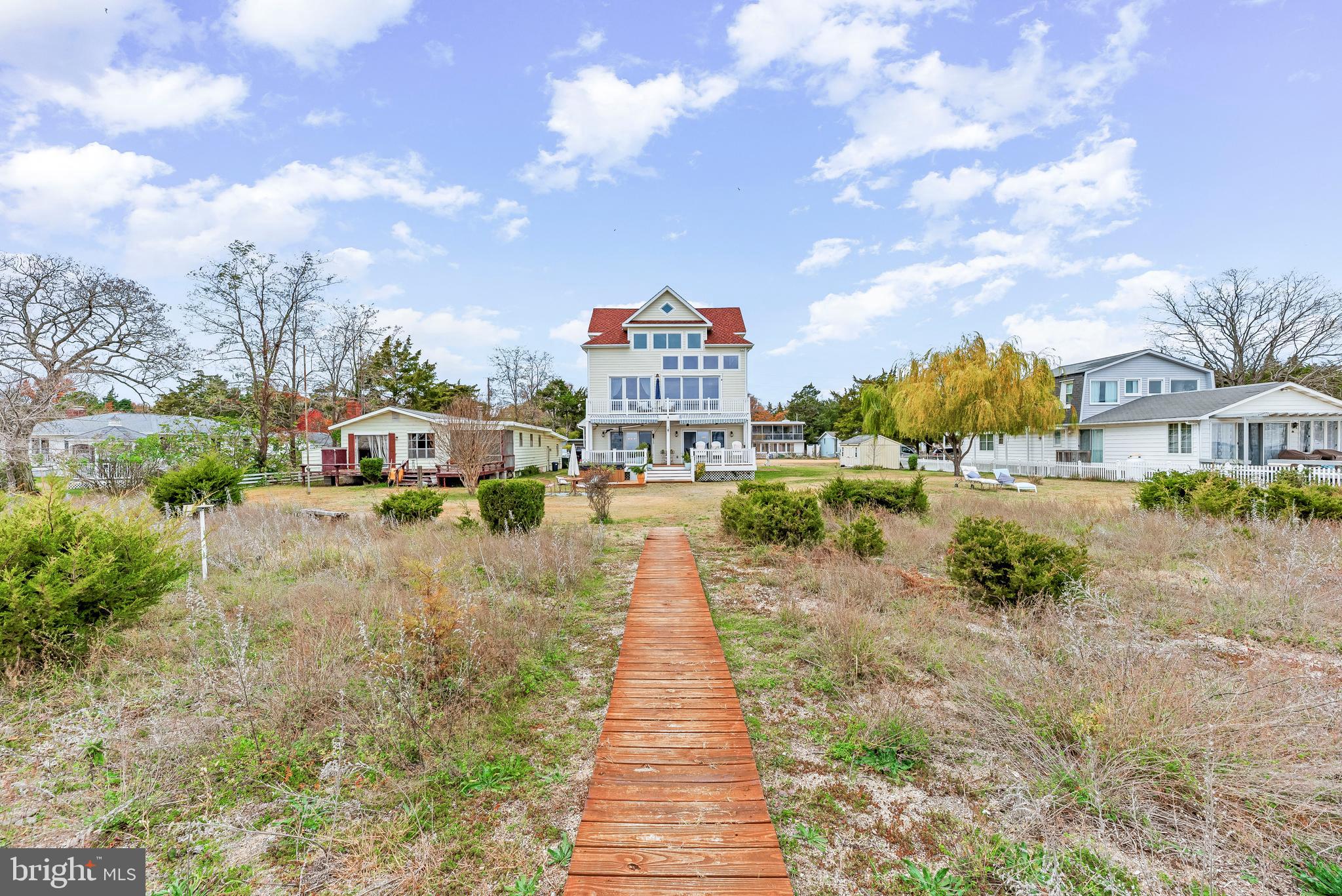 3095 Calvert Boulevard Lusby, MD 20657 - Photo 81 of 105 a view of multiple houses with yard