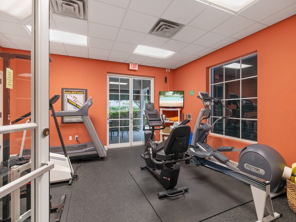 940 Turtle Cove Lane, Unit 302 Vero Beach, FL 32963 - Photo 24 of 30 a view of a room with gym equipment