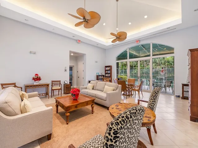 a view of a chairs and table in patio