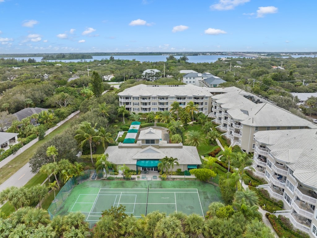 940 Turtle Cove Lane, Unit 302 Vero Beach, FL 32963 - Photo 3 of 30 a view of a terrace with chairs