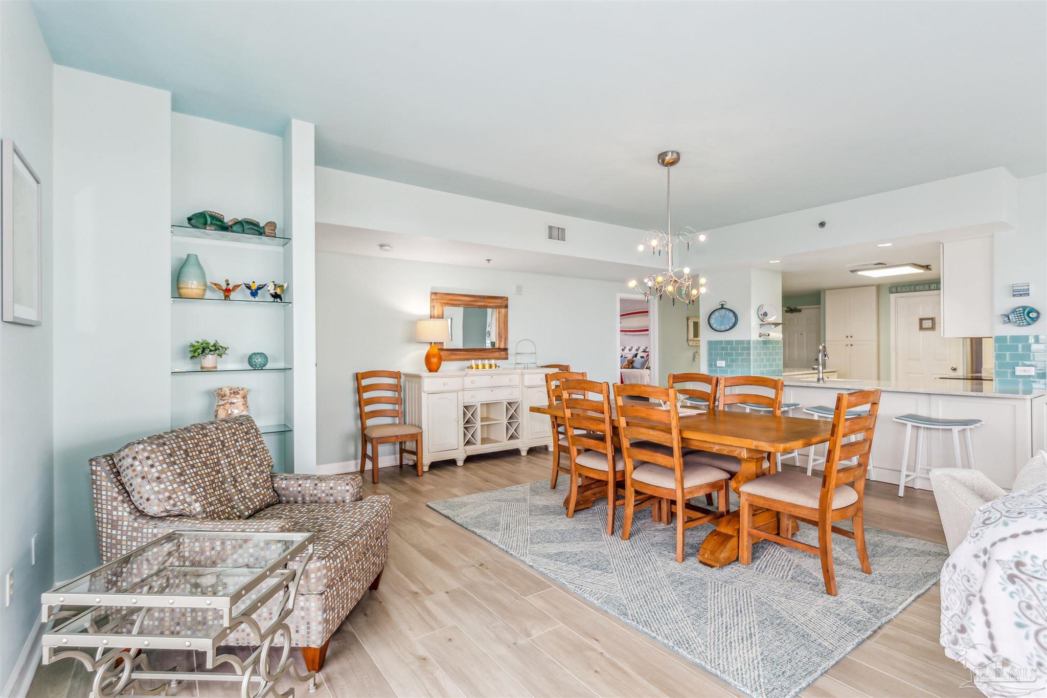 800 Fort Pickens Road, Unit 204 Pensacola Beach, FL 32561 - Photo 15 of 45 a living room with furniture and kitchen view