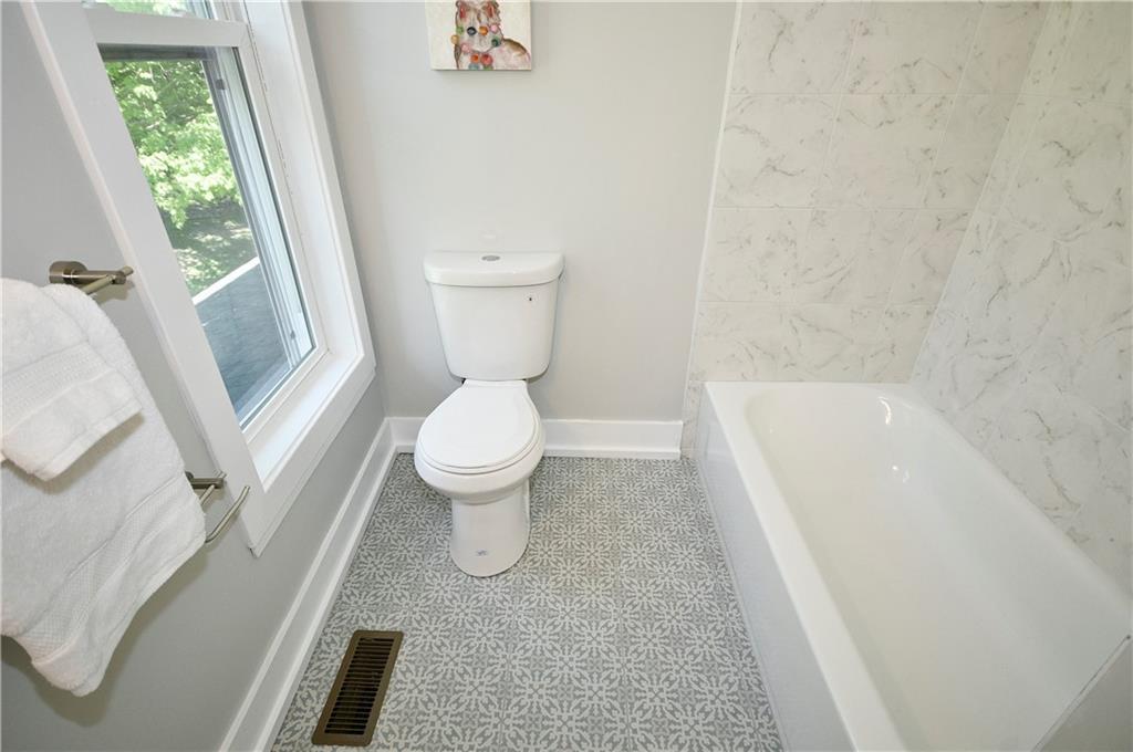 195 Vance Station Road Washington, PA 15301 - Photo 36 of 48 a white toilet sitting next to a bath tub