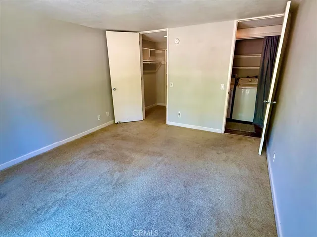 an empty room with closet