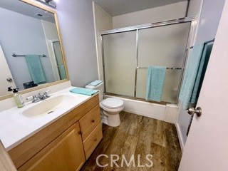 872 Sierra Vista Drive Twin Peaks, CA 92391 - Photo 20 of 37 a bathroom with a sink and a mirror