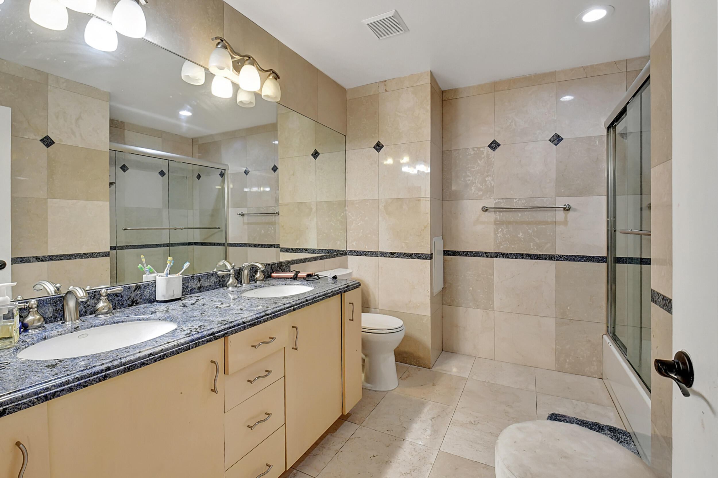 19615 Dinner Key Drive Boca Raton, FL 33498 - Photo 32 of 57 Secondary Bath with Dual Vanities