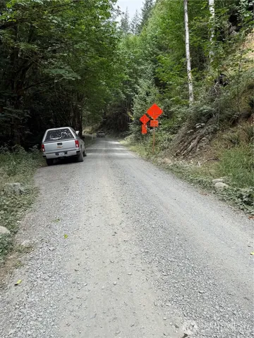 a car parked in front of a house