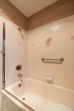 a room with a door and a cabinet